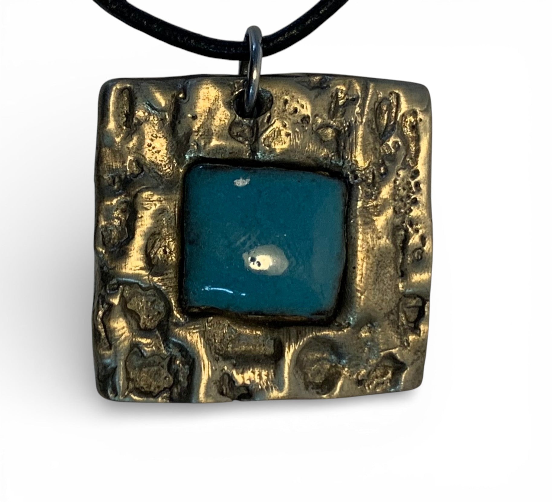 Bronze pendant with custom-made ceramic insert and leather chain