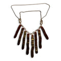 Amber blown glass necklace with eight gold-fumed glass drops on a brass chain