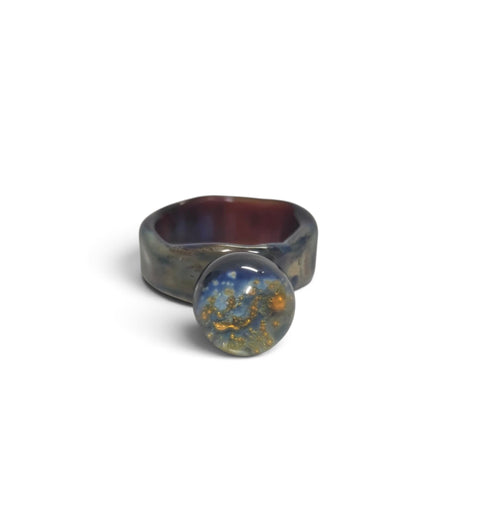 Borosilicate glass ring with a galaxy-like sphere in blue and gold