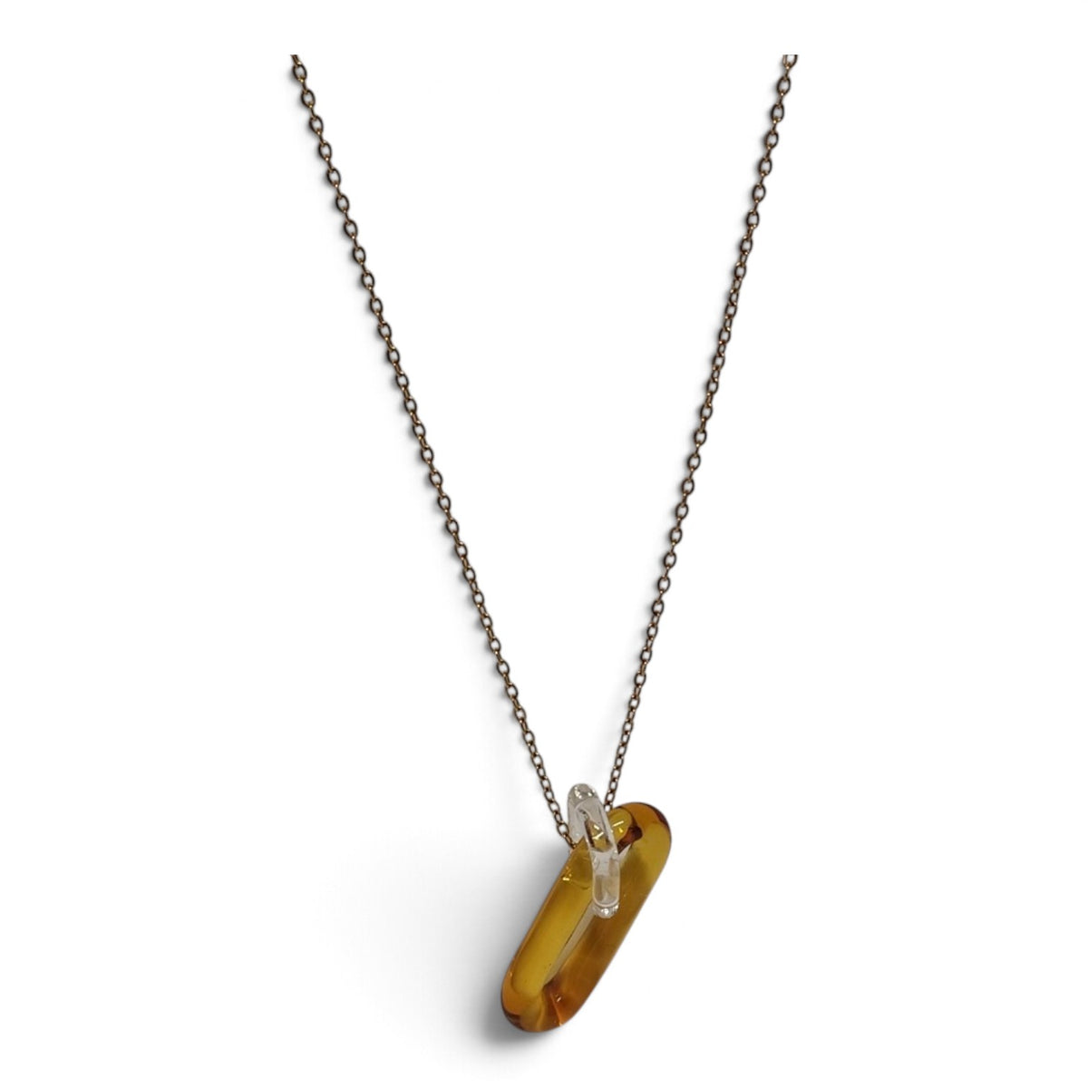 Amber glass link pendant, detail of the color gradient