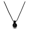 Black borosilicate glass pendant with blue dichroic flecks on a black cord
